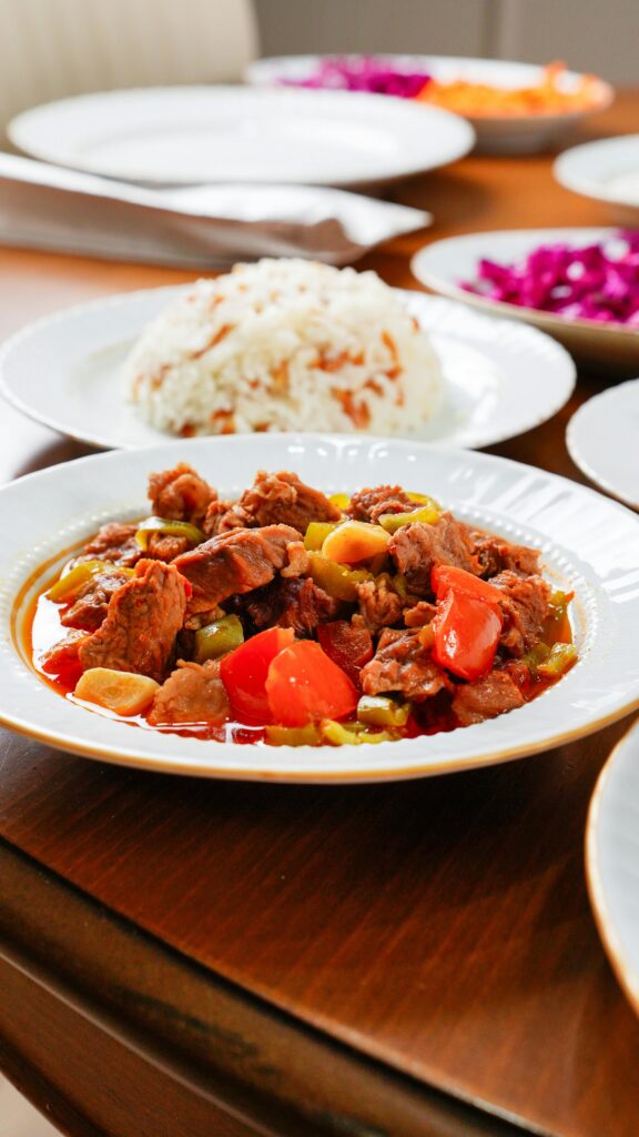 Savoury Turkish beef stew with vegetables served on a set table in Niğde, Türkiye.